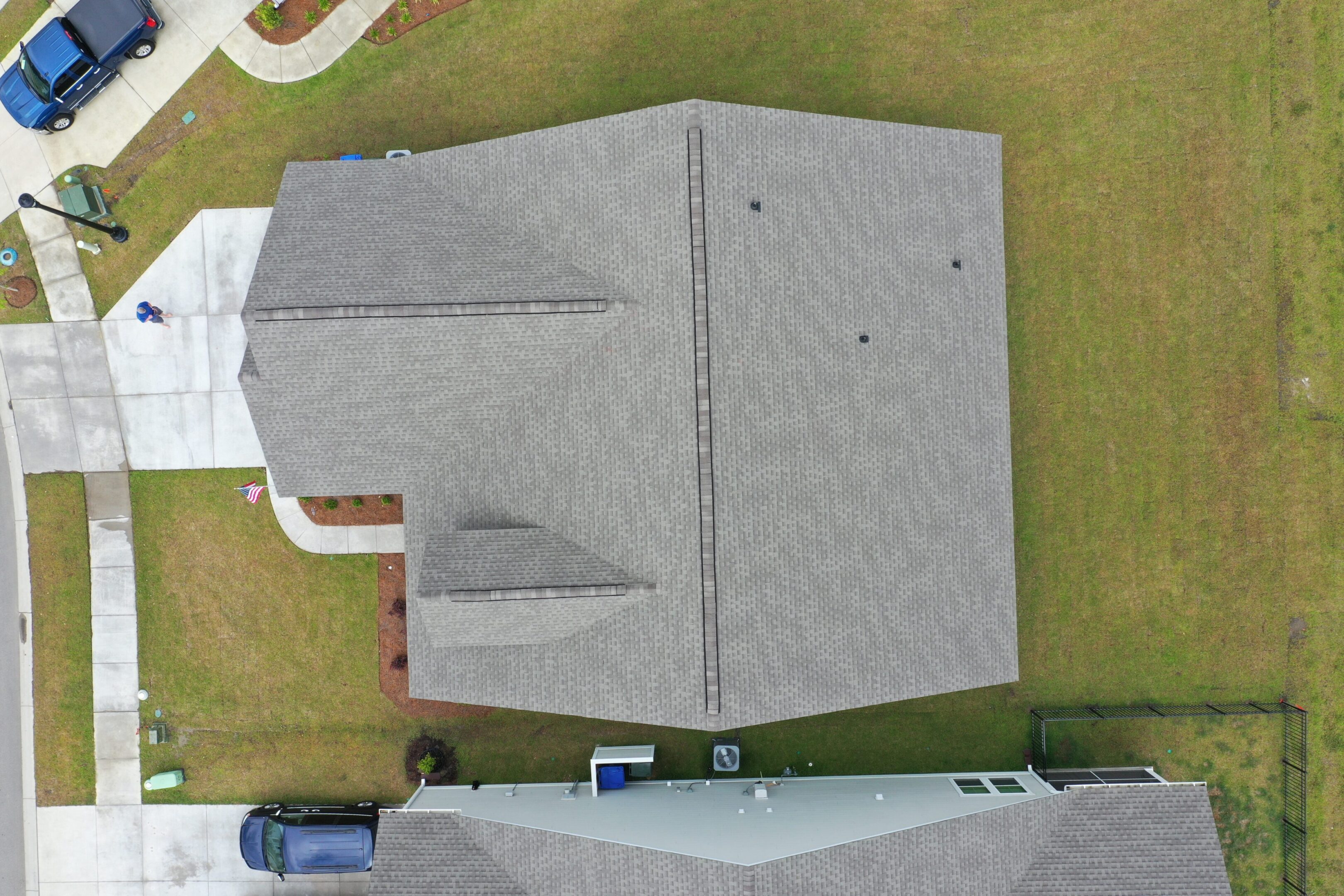 Aerial view of a house and driveway.