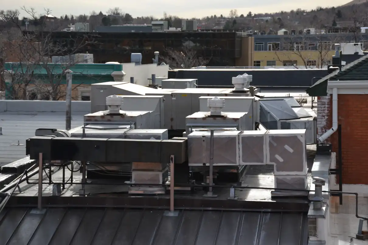 Drone inspecting wind turbines with digital overlays.